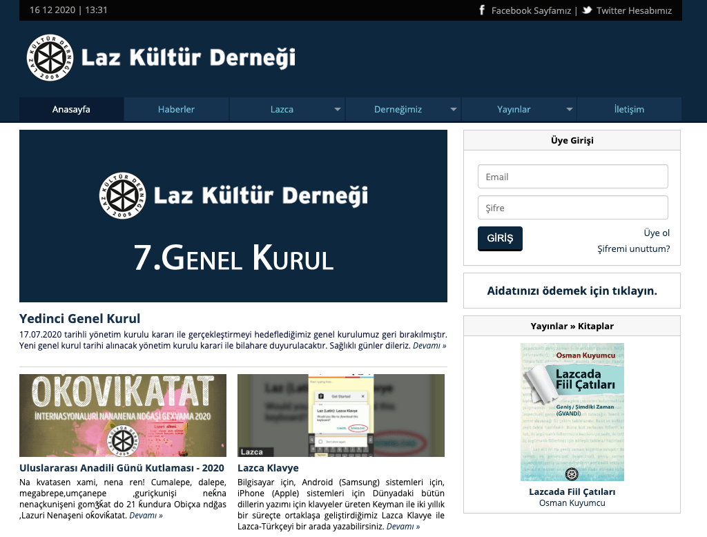 Screenshot of webpage with dark blue header and various articles arranged in blocks