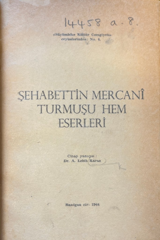 Cream-colour page of paper with text in black ink in Latin script at the top, bottom, and middle of the page.